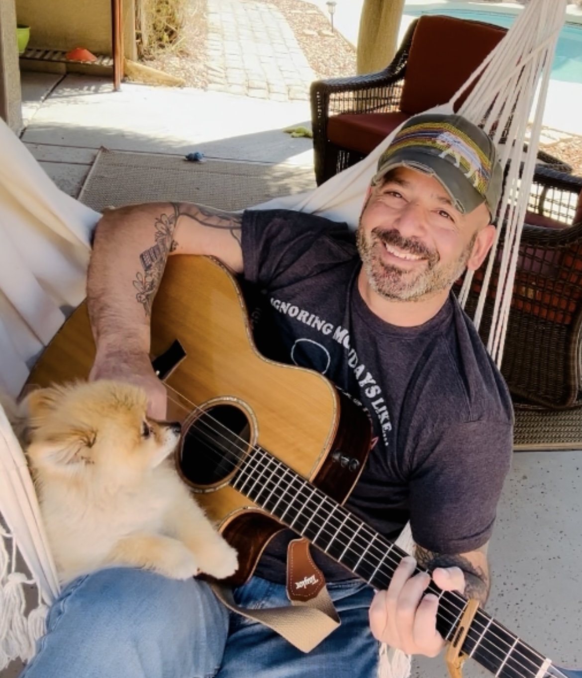 Adam with guitar and Luis